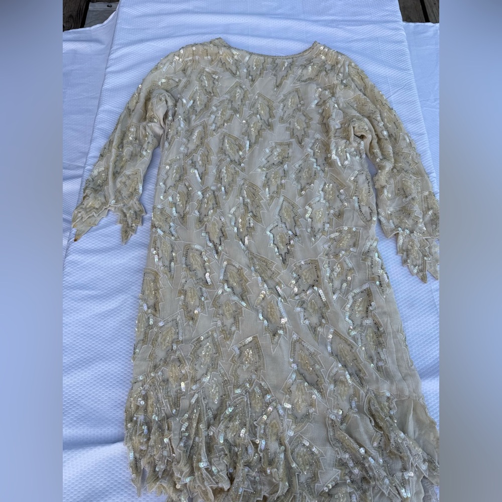 Elegant Women's Wedding Dress with Gold Embellishments